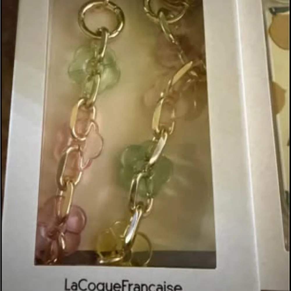 New LaCoqueFrançaise phone accessory set iPhone 16 pro Lemon case flower chain